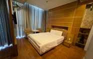 Bedroom 2 Lucky Star Hotel Q5