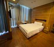 Bedroom 2 Lucky Star Hotel Q5