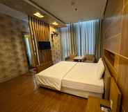 Bedroom 6 Lucky Star Hotel Q5