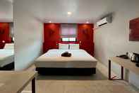 Kamar Tidur WE Terminal Hotel