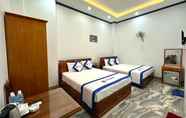Phòng ngủ 6 Dong Nam Hotel