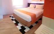 Kamar Tidur 3 Front One Inn Semarang