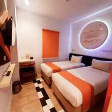 Bedroom 4 Front One Inn Semarang