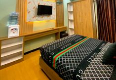 침실 5 The Suite Metro Apartement by Putri King