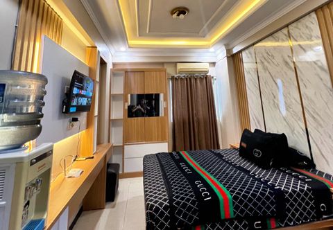 침실 The Suite Metro Apartement by Putri King