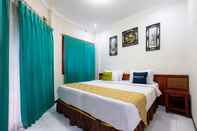 Kamar Tidur Urbanview Hotel Pasah Asi Gubeng by RedDoorz