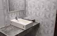 In-room Bathroom 6 Suja Cikditiro Guesthouse