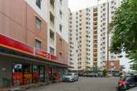 Bangunan RedLiving Apartemen Cibubur Village - Raja Property Tower D