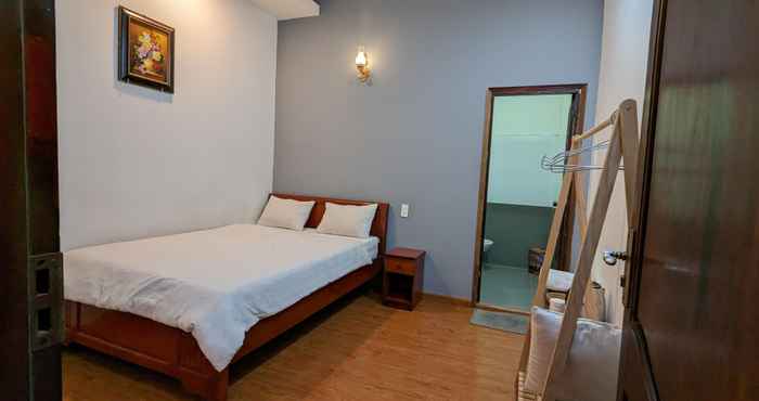 Kamar Tidur Holly Hostel