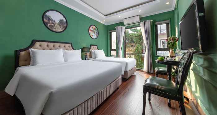 Phòng ngủ Madelise Adora Hotel & Travel