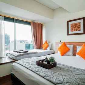 Bedroom 1 The Cabin Apartment Unit 9A03, Golden Dragon Band Hotels