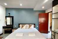 Kamar Tidur Traveller Inn Hotel