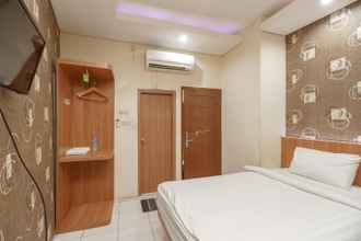 Bedroom 4 Green Apple Residence near Sarinah Mitra RedDoorz