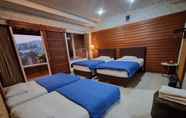 Kamar Tidur 4 Kirana Guest House Bandung