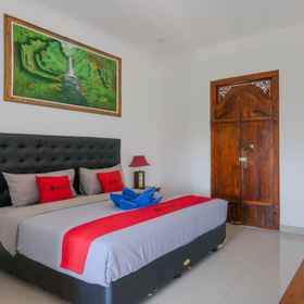 Bedroom 1 RedDoorz @ Uluwatu Suites, 库图 酒店