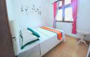 Kamar Tidur 2 Simply Homy Guest House Gembiraloka