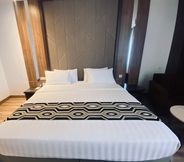 Kamar Tidur 4 Grand Maleo Hotel & Convention