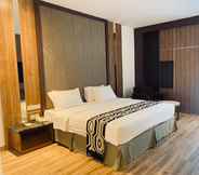 Bedroom 6 Grand Maleo Hotel & Convention