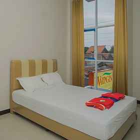 Bedroom 1 ワリンギン ゲストハウス テガル ミトラ レッドドアーズ, Sego Sambel Yu Sum ホテル