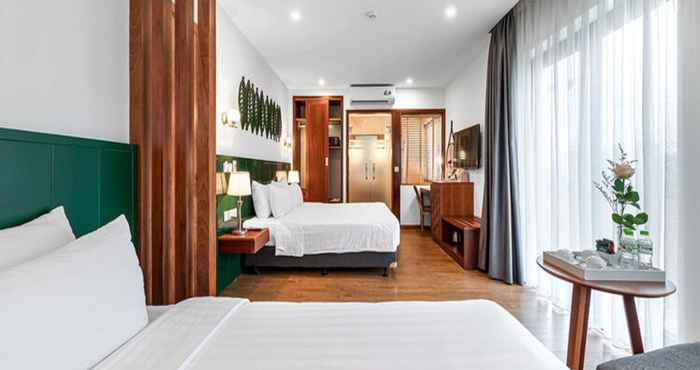 Phòng ngủ 22Land Classic Suites