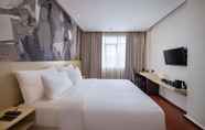 Bedroom 2 Four Star by Trans Hotel