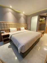 Kamar Tidur 4 Opa Hotel Palembang