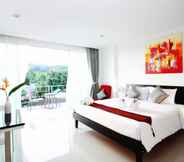 Bedroom 3 One World One Home Naiharn Hotel