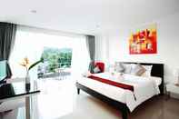 Bedroom One World One Home Naiharn Hotel