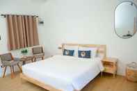 ห้องนอน RoomQuest Phuket Patong Beach