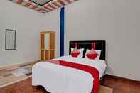 Bedroom OYO 92455 Hadhilfa Homestay Syariah