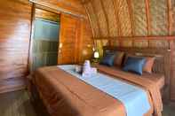 ห้องนอน Batur Bamboo Cabin by ecommerceloka