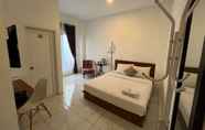 Bedroom 3 Rayana Resort Mitra RedDoorz