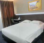 Kamar Tidur 4 Baba Guest House Syariah