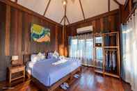ห้องนอน Tongna Cottage Natural Resort