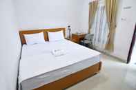 Kamar Tidur Rich Guesthouse