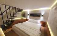 Kamar Tidur 3 New Golden Clouds Homestay