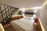 Kamar Tidur New Golden Clouds Homestay