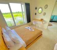 ห้องนอน 7 Tanawu Airport Hotel