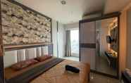 Bedroom 5 Apartemen Grand Kamala Lagoon by Fortune88