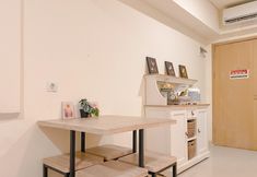 Common Space 7 Modern and Cozy 2BR at Meikarta Apartment By Travelio