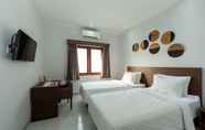 Kamar Tidur 4 Cove Matahari Guesthouse