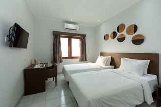 Kamar Tidur 4 Cove Matahari Guesthouse