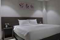 Bedroom Lun Hotel Manado