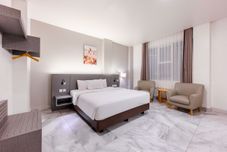 Bedroom Grand Thamrin Hotel