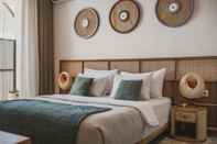 Kamar Tidur Eight Palms Villa Seminyak by Ini Vie Hospitality