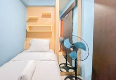 Phòng ngủ 5 Homey and Good Living 2BR at Jarrdin Cihampelas Apartment By Travelio