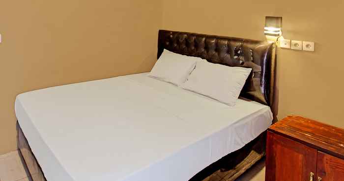 Kamar Tidur Capital O 92747 Ombak Cafe & Homestay