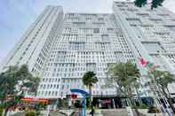 Luar Bangunan RedLiving Apartemen Patra Land Urbano - Happy Rooms Tower Mid-West with Netflix