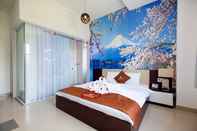 Kamar Tidur Thanh Vinh Hotel Cu Chi