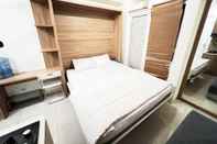 Kamar Tidur Green Pramuka City by Aok Property